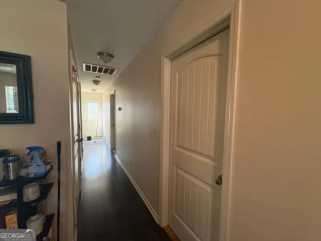 a view of hallway with livingroom