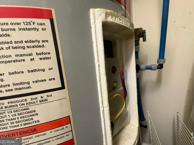 a view of a door and wooden floor