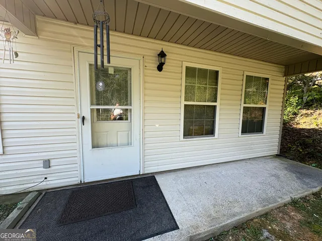 a view of front door and porch