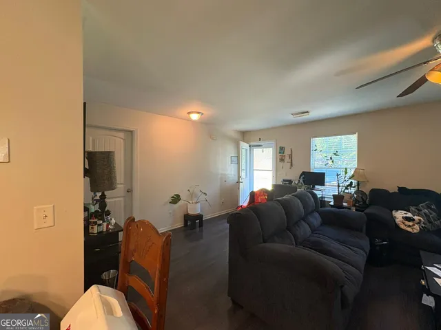 a living room with furniture and a couch