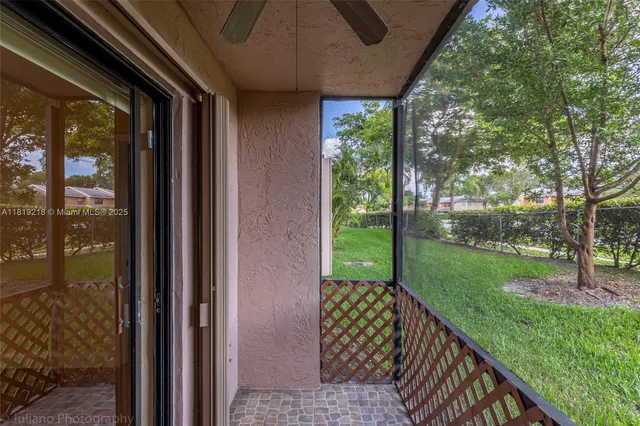 a view of a porch with a yard