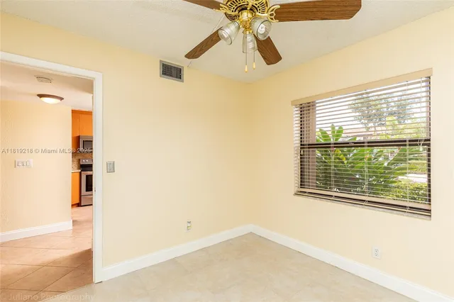 a view of a bedroom with a window