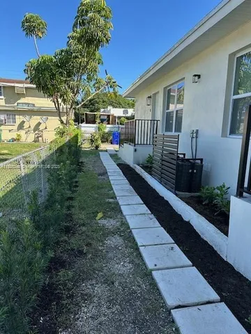 a view of a porch with a yard
