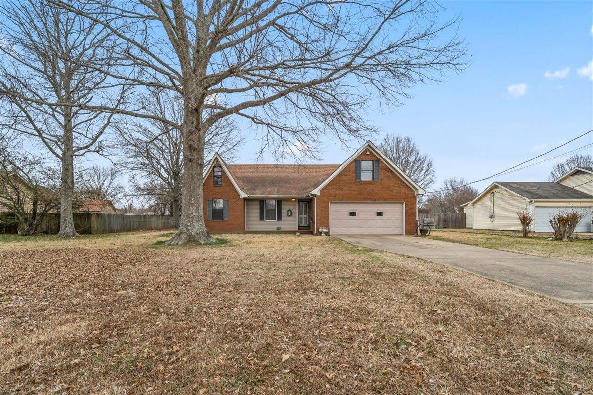 1426 Simmons Road Drummonds, TN 38023 - Photo 2 of 29 a house with a outdoor space