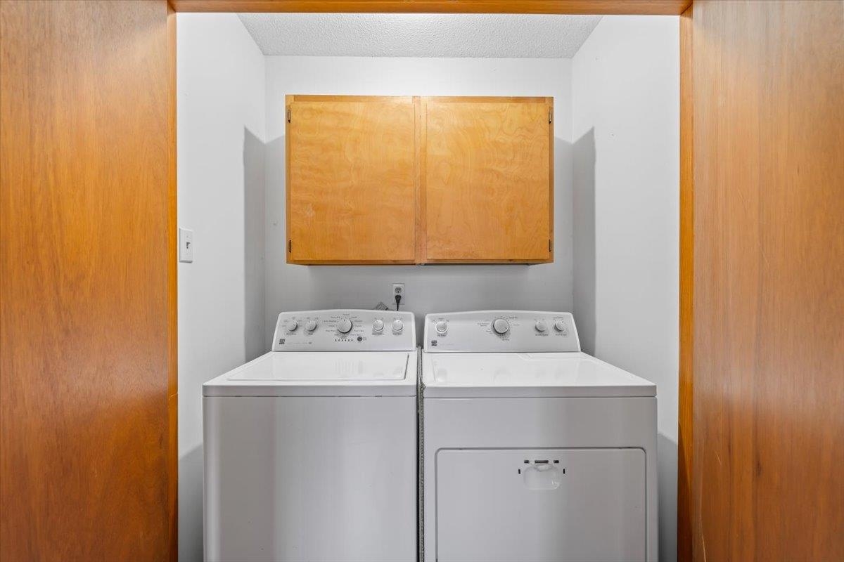 1426 Simmons Road Drummonds, TN 38023 - Photo 24 of 29 a utility room with dryer and washer
