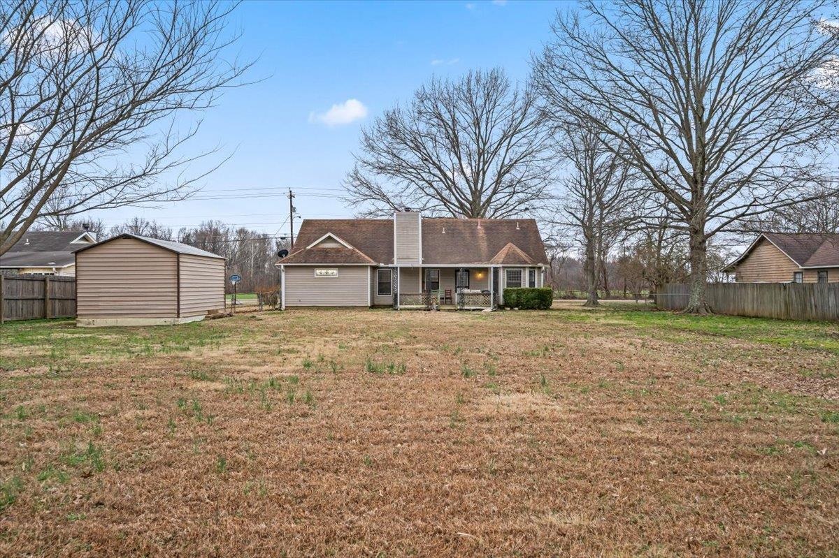 1426 Simmons Road Drummonds, TN 38023 - Photo 28 of 29 a front view of a house with a yard