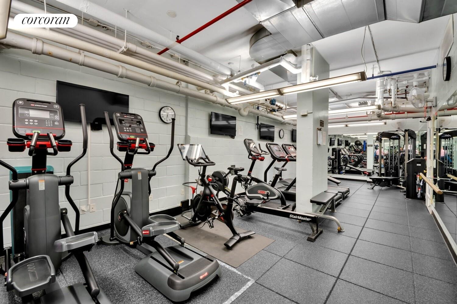 535 East 86th Street, Unit 6F Manhattan, NY 10028 - Photo 19 of 22 a view of a room with gym equipment