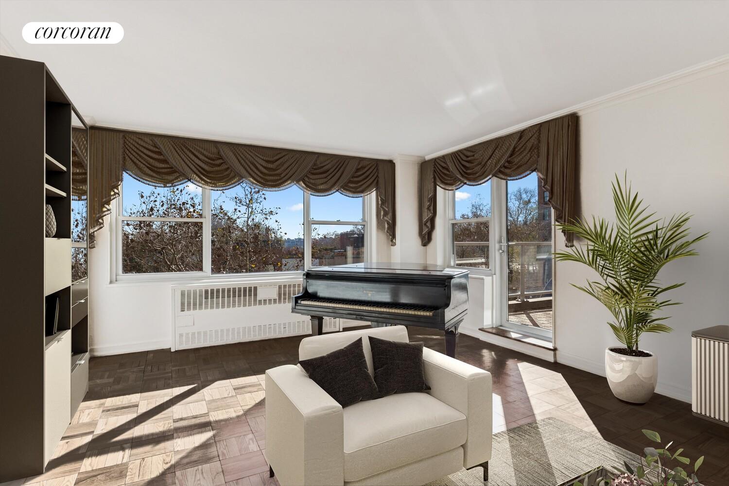 535 East 86th Street, Unit 6F Manhattan, NY 10028 - Photo 2 of 22 a living room with furniture and a large window