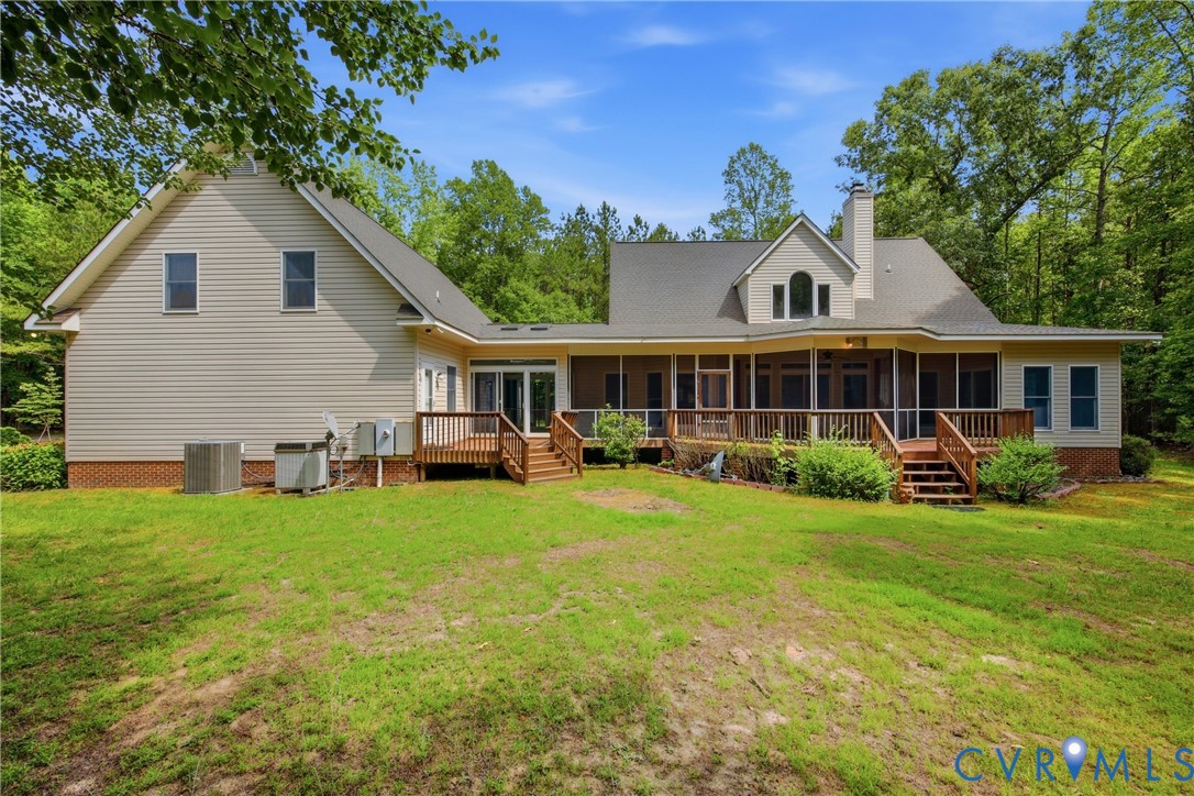 13265 Coulbourn Road Saluda, VA 23149 - Photo 49 of 62 Spacious rear exterior featuring light-toned sidin