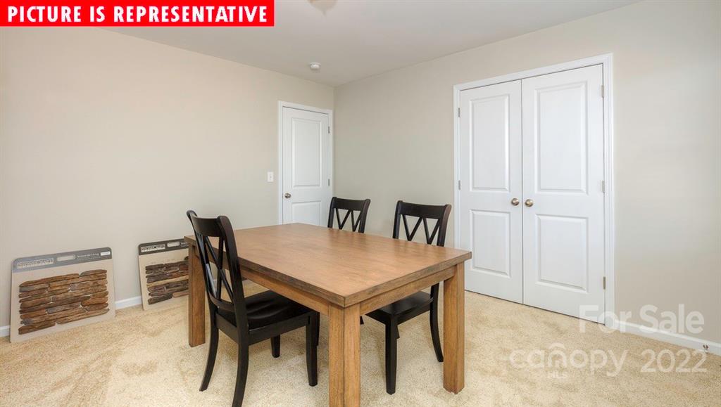 104 Kona Road Mooresville, NC 28117 - Photo 33 of 38 a view of a table and chairs in a room