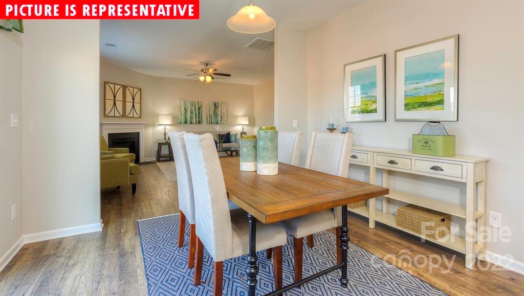 104 Kona Road Mooresville, NC 28117 - Photo 5 of 38 a view of a dining room with furniture