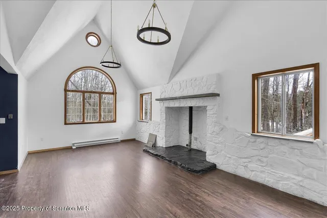 a kitchen with stainless steel appliances granite countertop a refrigerator stove and sink