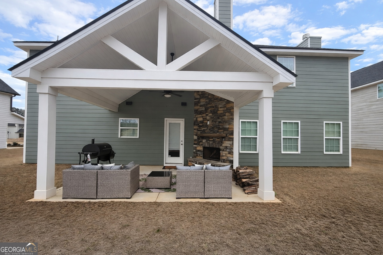 4355 Cornwall Drive Forsyth, GA 31029 - Photo 20 of 23 a view of a house with couches in front of house