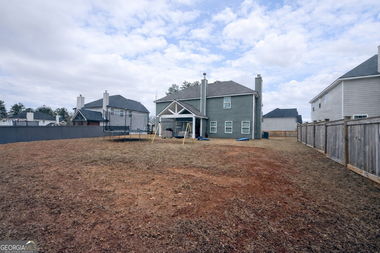 4355 Cornwall Drive Forsyth, GA 31029 - Photo 23 of 23 a view of residential houses with city view