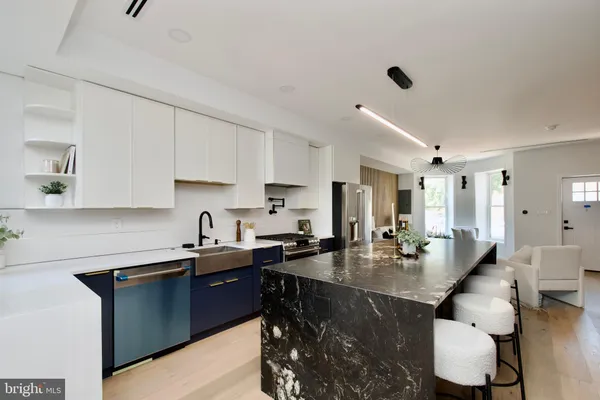 a kitchen with a sink and cabinets
