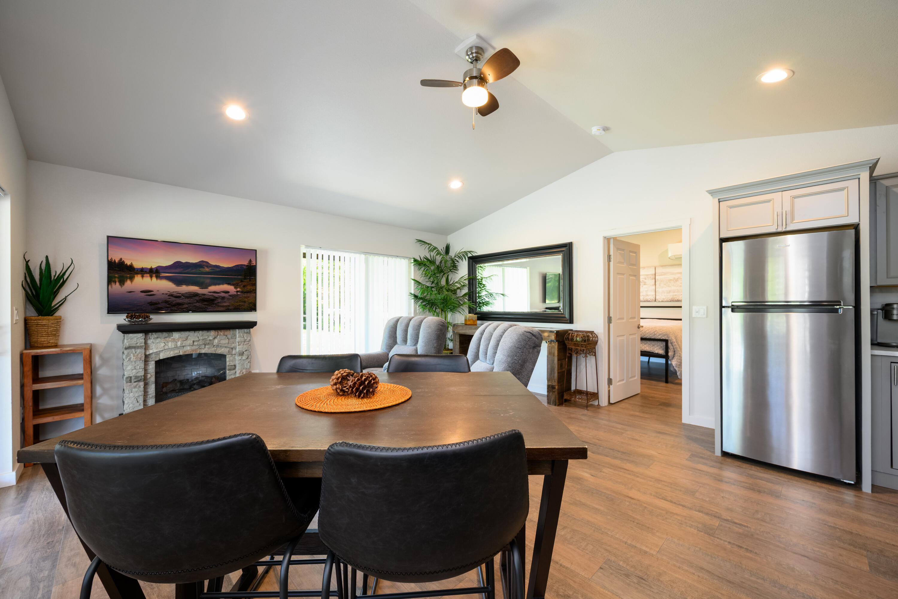 2546 Fisher Road Roseburg, OR 97471 - Photo 42 of 59 a dining room with furniture a window and wooden floor