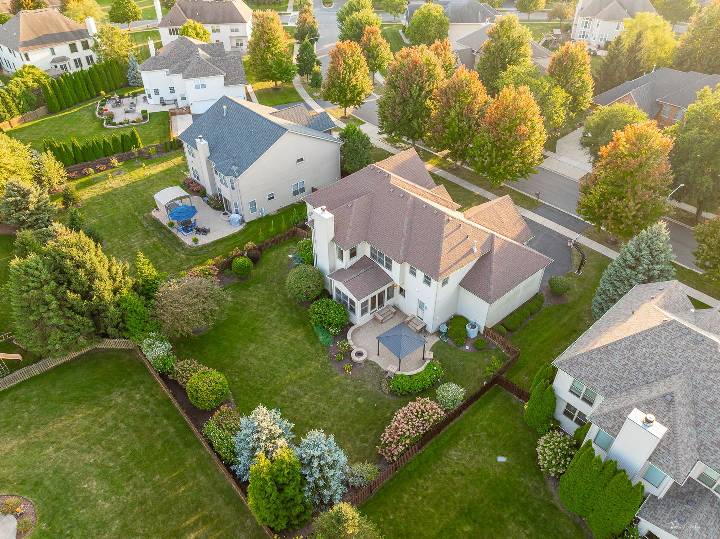 12929 Alpine Way Plainfield, IL 60585 - Photo 4 of 55 an aerial view of a house with a garden