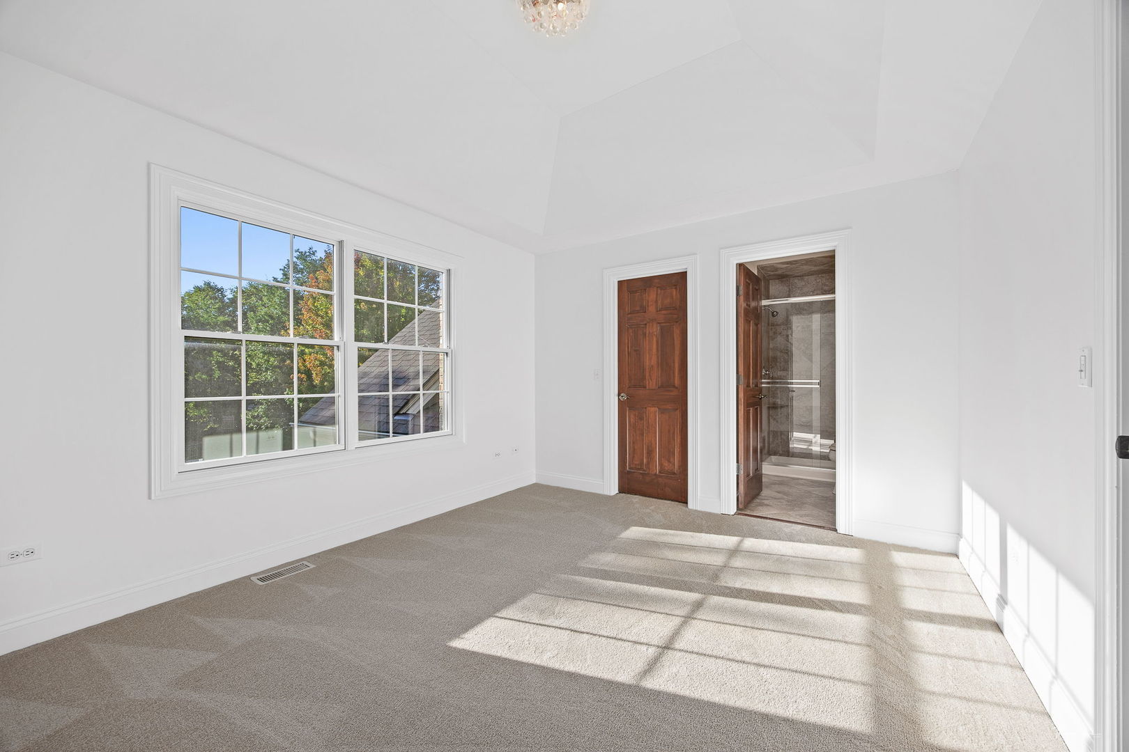 12929 Alpine Way Plainfield, IL 60585 - Photo 43 of 55 a view of an empty room with a window