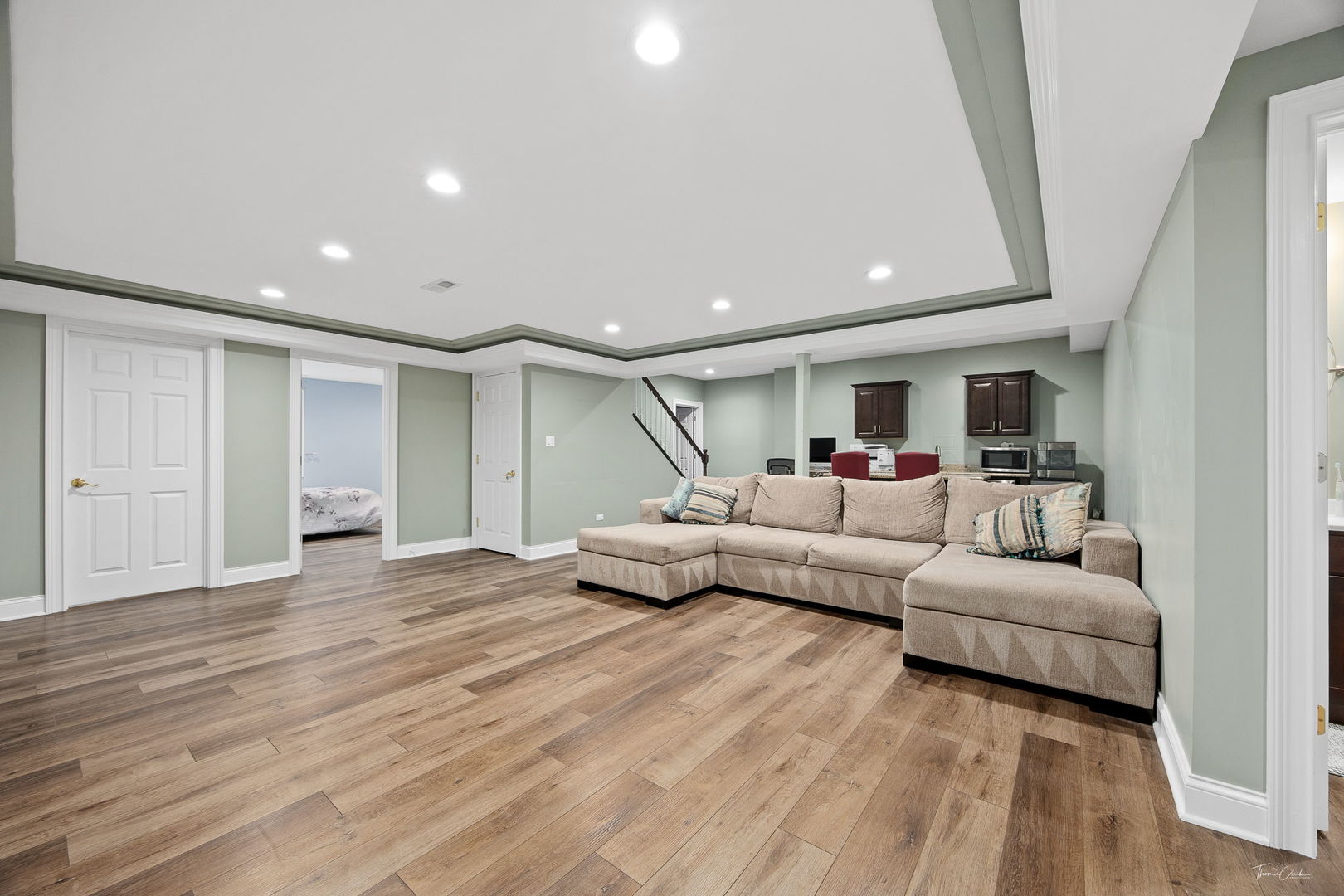 12929 Alpine Way Plainfield, IL 60585 - Photo 45 of 55 a living room with furniture and a wooden floor