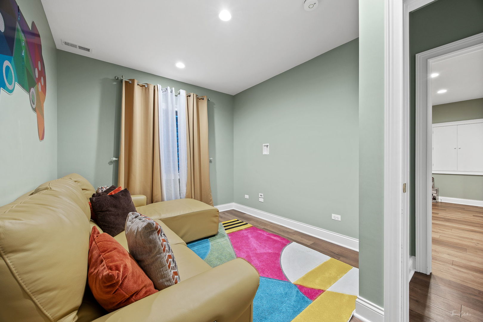 12929 Alpine Way Plainfield, IL 60585 - Photo 48 of 55 a bedroom with a bed and a painting on the wall