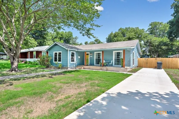 a view of outdoor space yard and front view of a house