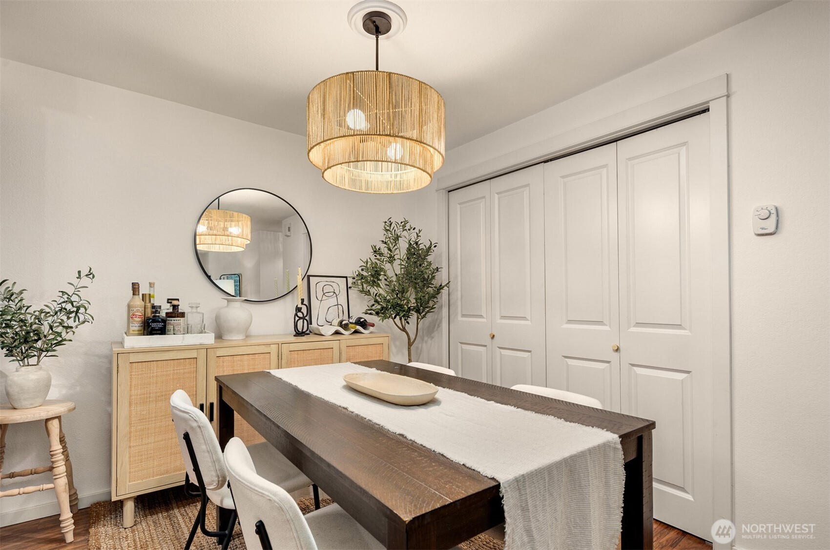 215 9th Street, Unit D102 Kirkland, WA 98033 - Photo 13 of 29 a view of a dining room with a table and chairs