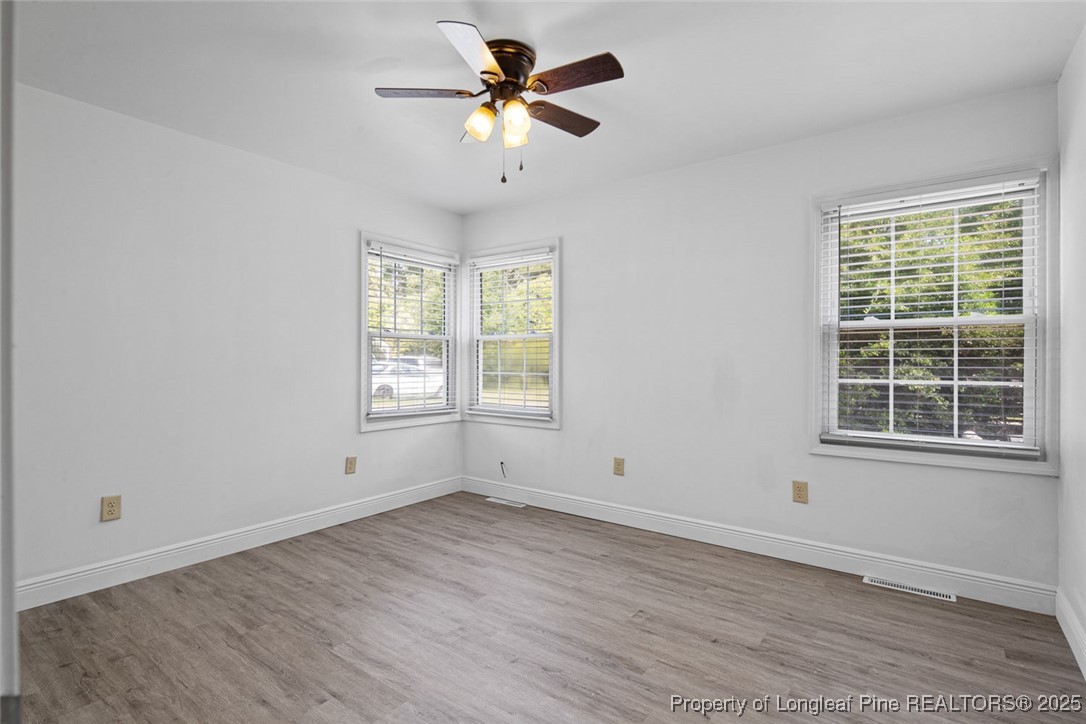 613 East 3rd Avenue Red Springs, NC 28377 - Photo 14 of 37 a view of an empty room with a window