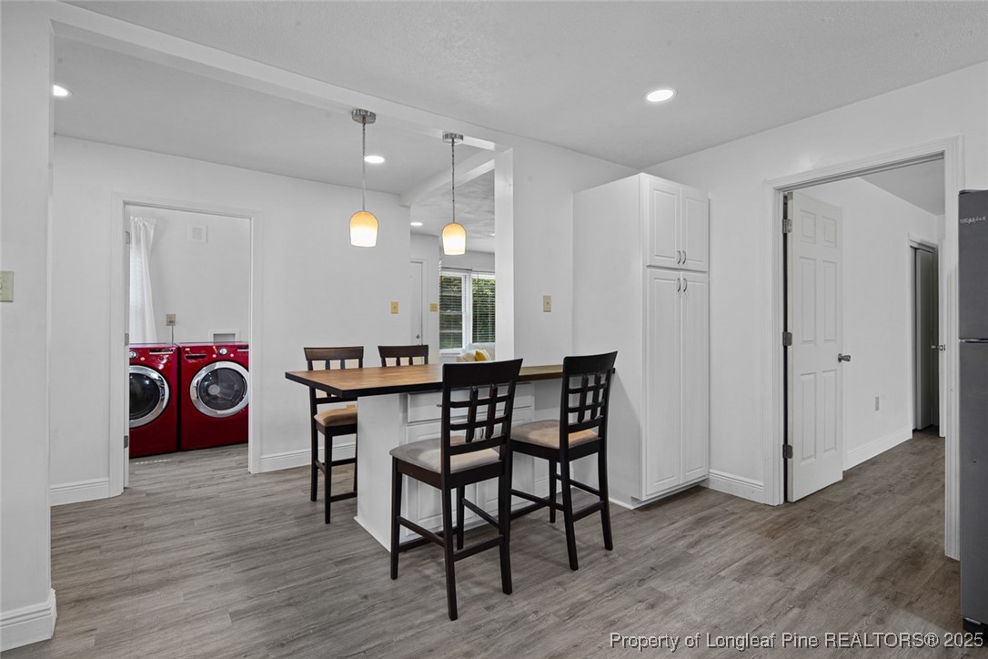 613 East 3rd Avenue Red Springs, NC 28377 - Photo 22 of 37 a view of a dining room with furniture and wooden floor