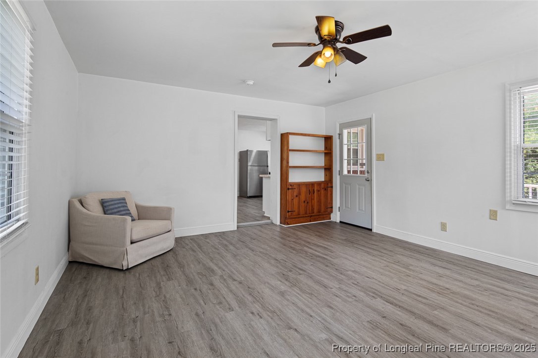 613 East 3rd Avenue Red Springs, NC 28377 - Photo 30 of 37 an empty room with furniture and windows