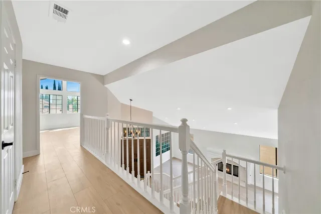 a view of a livingroom with a ceiling fan and window