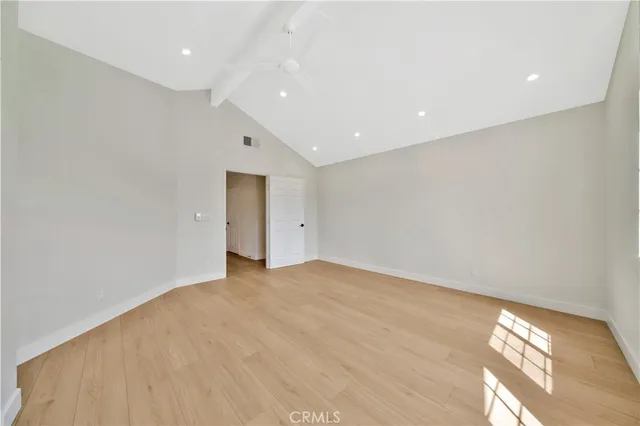 a bathroom with a sink a mirror and shower