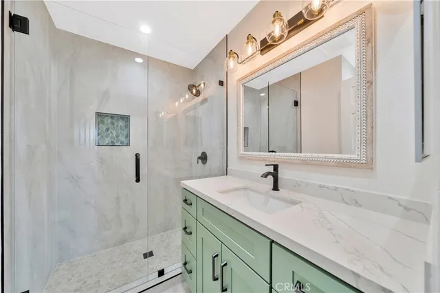 a view of a backyard with plants and a patio