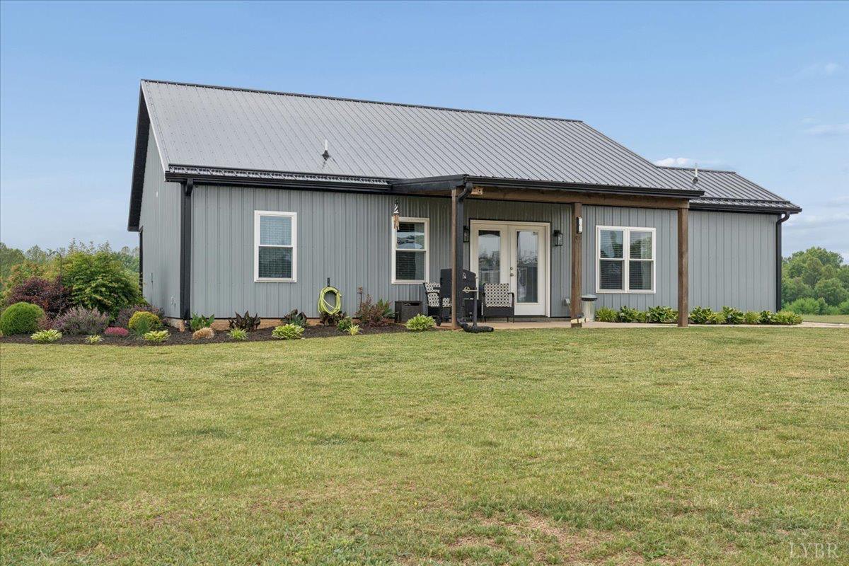 578 Collins Ferry Road Gladys, VA 24554 - Photo 24 of 36 a front view of house with yard and trees
