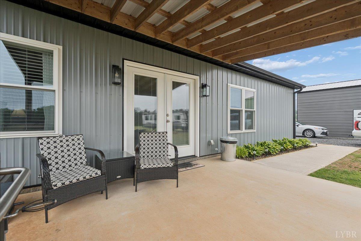 578 Collins Ferry Road Gladys, VA 24554 - Photo 26 of 36 a outdoor living space with furniture