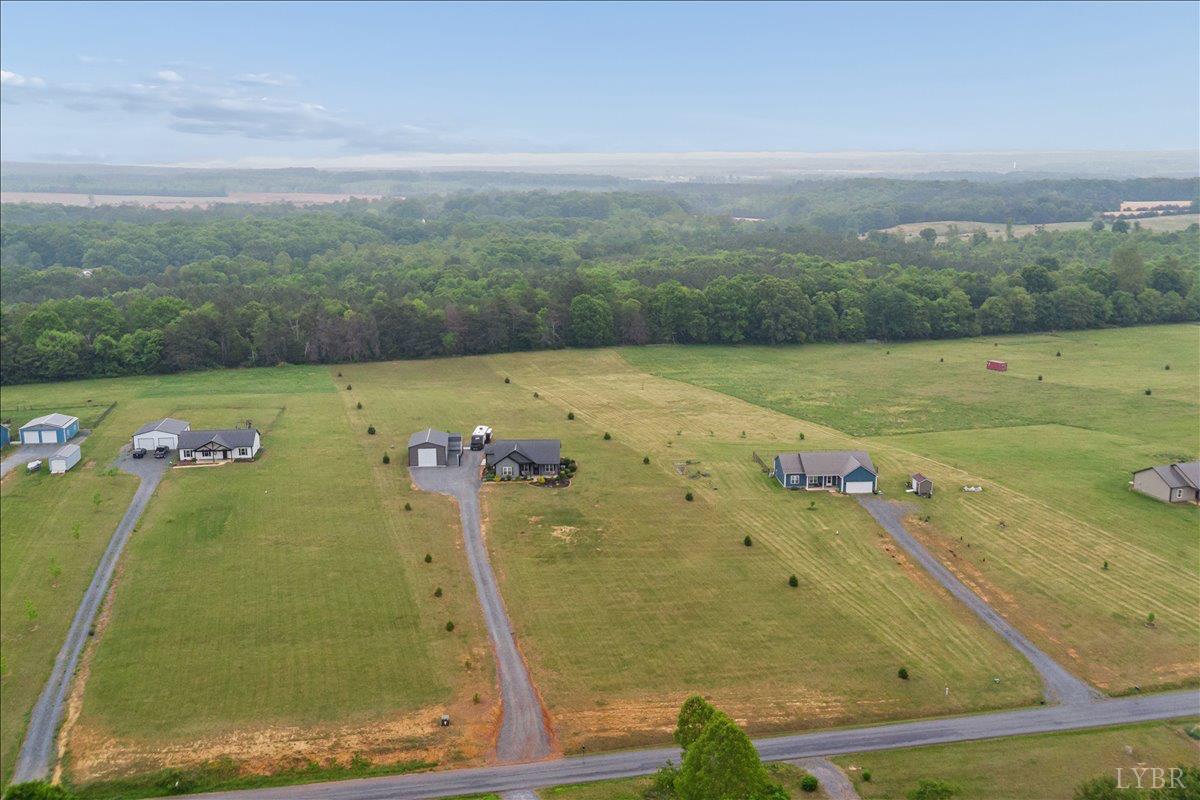 578 Collins Ferry Road Gladys, VA 24554 - Photo 35 of 36 a view of a swimming pool with a yard