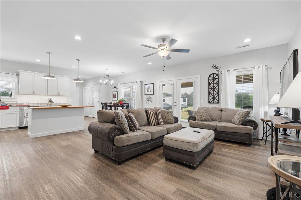 578 Collins Ferry Road Gladys, VA 24554 - Photo 6 of 36 a living room with furniture and kitchen view