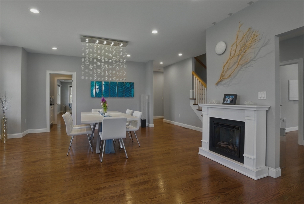 186 Concord Road Bedford, MA 01730 - Photo 12 of 40 a view of a dining room with furniture window and wooden floor