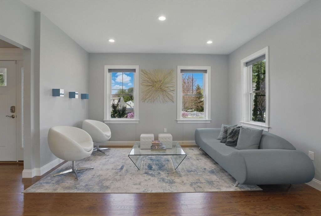 186 Concord Road Bedford, MA 01730 - Photo 13 of 40 a living room with furniture and a large window