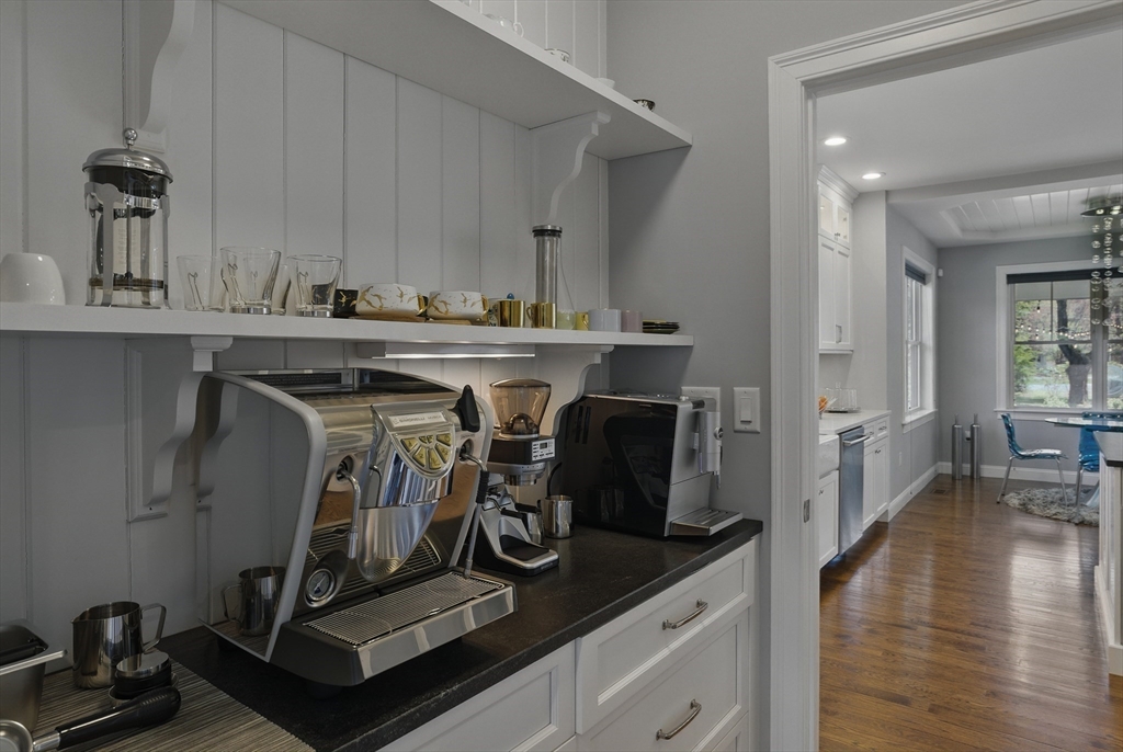 186 Concord Road Bedford, MA 01730 - Photo 15 of 40 a view of a kitchen with appliances and cabinets