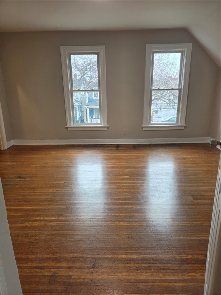 21 Gardiner Park Rochester, NY 14607 - Photo 20 of 22 north facing bedroom, gleaming hardwoods and an ab