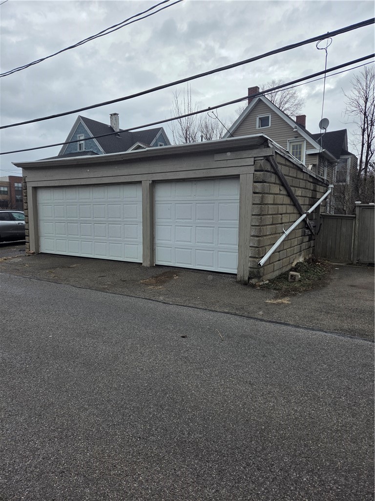 21 Gardiner Park Rochester, NY 14607 - Photo 4 of 22 Rear of home. Single car bay garage included