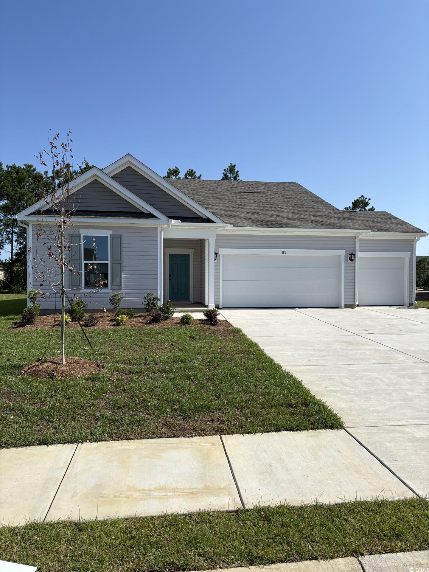 183 Glengrove Lane Murrells Inlet, SC 29576 - Photo 1 of 38 Ranch-style house featuring a garage, driveway, an