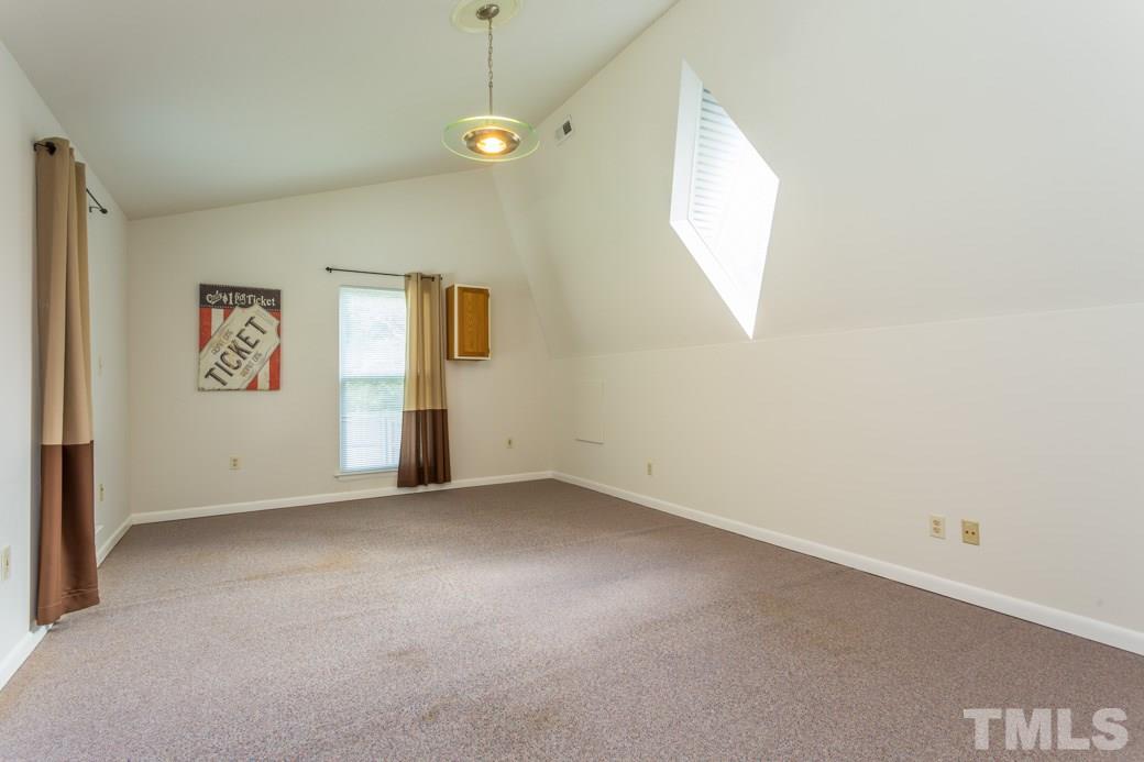 4517 Brost Court Raleigh, NC 27616 - Photo 9 of 11 BONUS room with SEPARATE EXTERIOR ACCESS great for OFFICE, HOBBY room, exercise STUDIO or whatever else you can dream of! With separate hall/stairs, this is IDEAL when you need EXTRA PRIVACY.