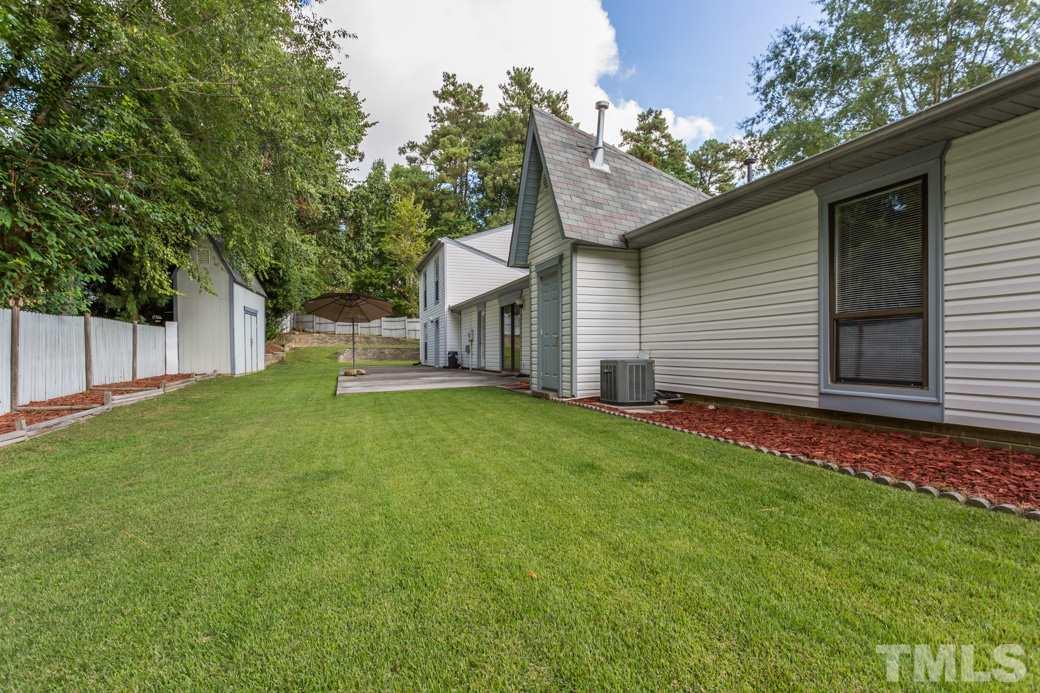 4517 Brost Court Raleigh, NC 27616 - Photo 10 of 11 GENEROUS lot offers LEVEL playing field for all your OUTDOOR activities! FENCED with DETACHED STORAGE. CLEAN PALETTE allows for your PERSONAL TOUCH!