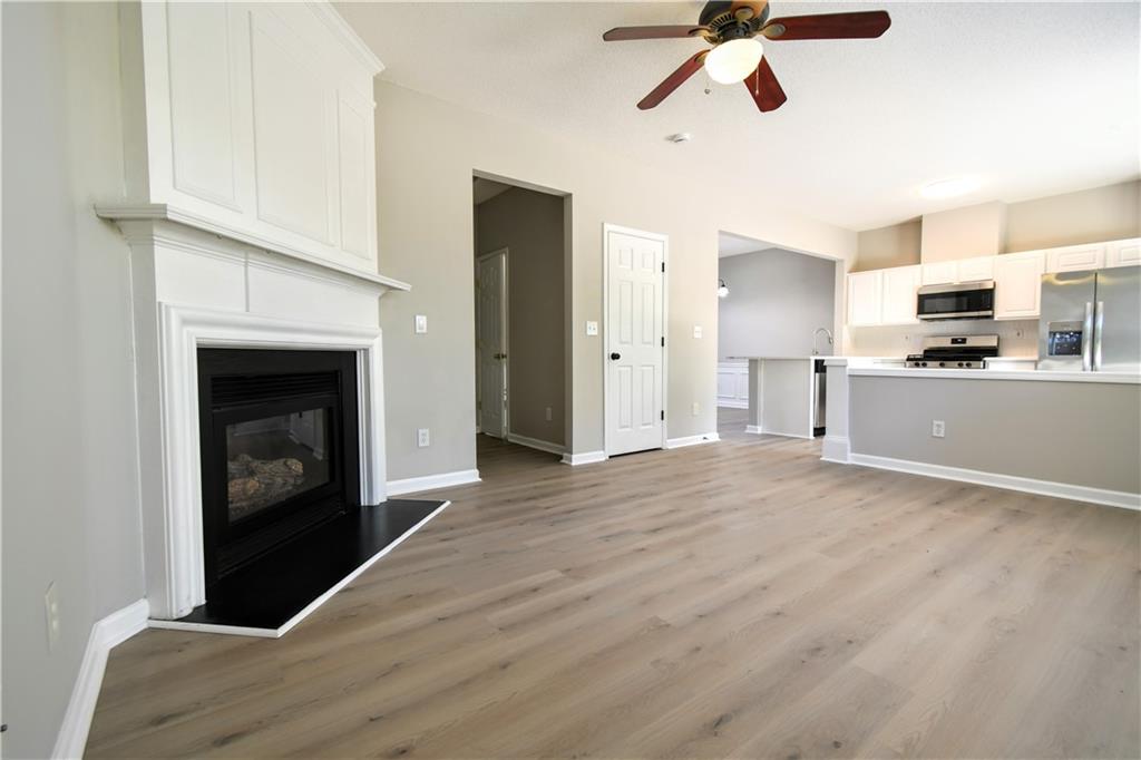 3905 Timbercreek Circle Roswell, GA 30076 - Photo 15 of 30 a view of a kitchen with a sink a fireplace and window