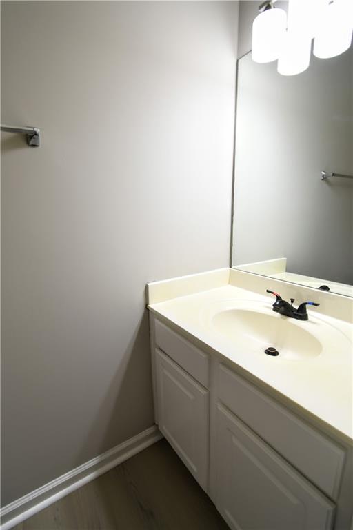 3905 Timbercreek Circle Roswell, GA 30076 - Photo 16 of 30 a bathroom with a sink and a mirror