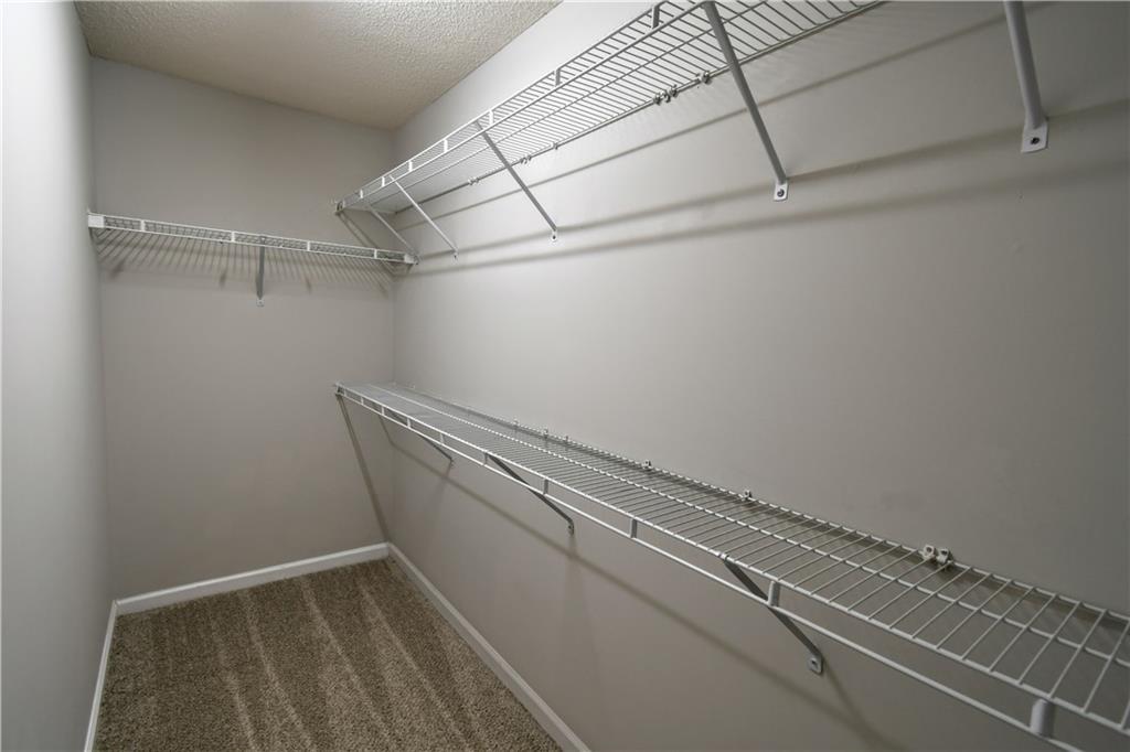 3905 Timbercreek Circle Roswell, GA 30076 - Photo 22 of 30 a view of a room with racks on the wall