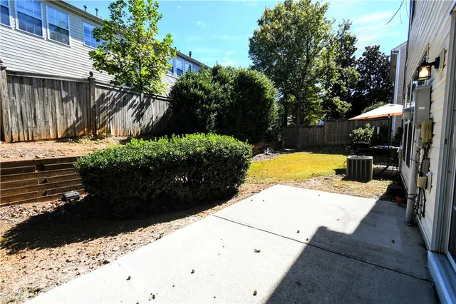 a view of a backyard of the house