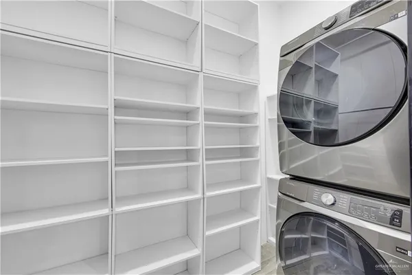 a utility room with washer and dryer
