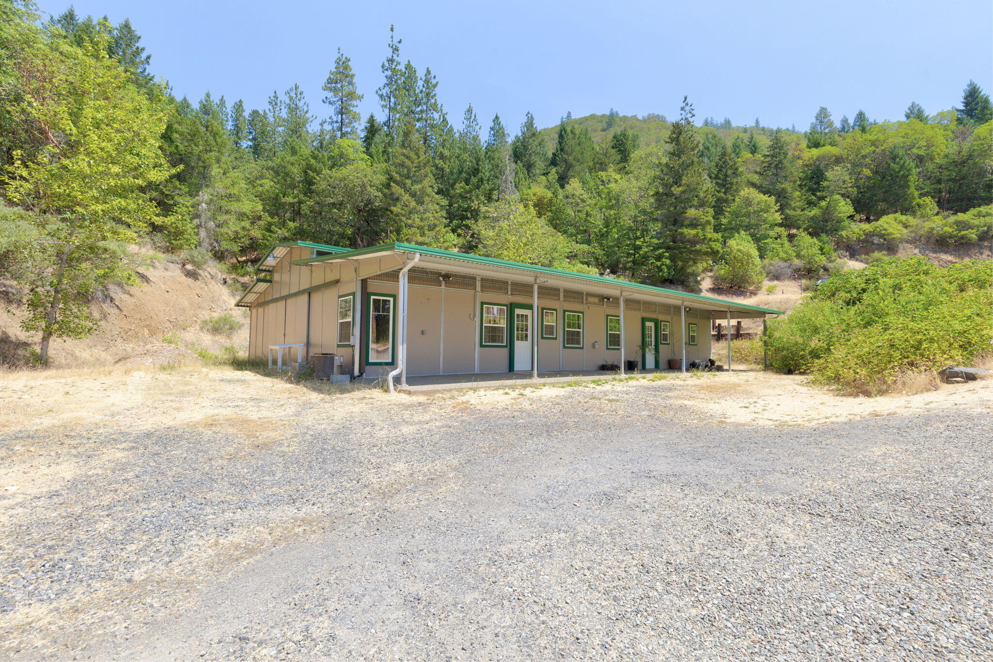 7304 North Applegate Road Grants Pass, OR 97527 - Photo 55 of 87 a view of a house with a outdoor space